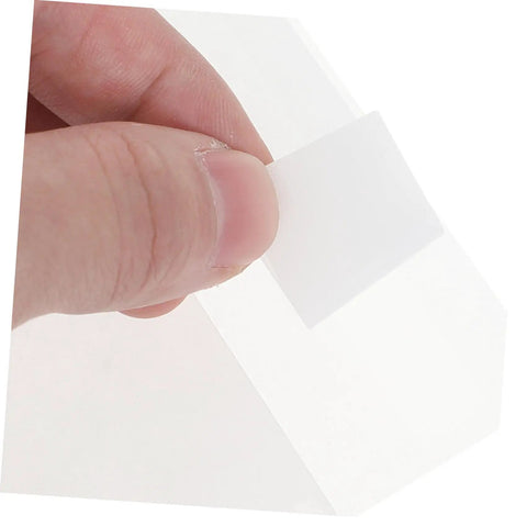 Close-up of a hand holding the Translucent Glassine Envelopes 200 Pack 9x12 Plus 3cm Frosted Paper Bags For Letters Cards.