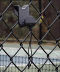 Chain Link Fence Hook For Sports Bags With Paracord Lanyard Heavy Duty Fence Hanger installed on a chain-link fence at a court