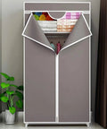 Game Changer Portable Hanging Closet With Heavy Duty 19Mm Steel Clothes Rod Space Saving Wardrobe Rack Storage Organizer For Shoes Hats And Scarves Smooth Assembly Purple with open door revealing folded clothes.