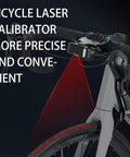 Badass Bicycle Laser Calibrator And Saddle Positioner Bike Tool With Integrated Charging Port illuminating bike handlebar alignment.