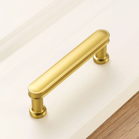 3 Inch Brushed Gold Cabinet Handles Set, 10 Pack Gold Cabinet Pulls, solid metal hardware with smooth rounded edges on white surface
