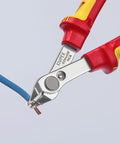 Insulated 5 Inch Diagonal Cutting Pliers With 1000V VDE Rating cutting a wire, showcasing flush cut precision and tool's red handle
