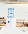 Portable Mini Countertop Water Dispenser For Bottled Water Compact Cold Water Cooler in kitchen setting