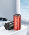 Top Shelf 4680 And 4695 Battery Case With Heavy Duty Shield, black and red power bank on a table near sunglasses.