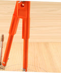 Heavy Duty Adjustable Carpenter Scribing Divider Precision Woodworking Marking Compass with orange arms and pen on wood surface.
