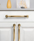 3 Inch Hole Center Brushed Brass Cabinet Pulls 10 Pack Heavy Duty Solid Drawer Handles installed on white kitchen cabinet