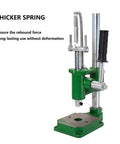 Heavy Duty Arbor Press With 700 Lbs Capacity And No Sweat Spring Action features a thick spring and robust green cast iron base.