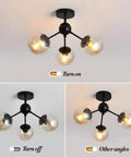 Three Light Glass Globe Chandelier Matte Black Nordic Style Semi Flush Mount Ceiling Fixture shown lit and unlit