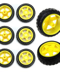 Eight Pack Dope Wheel Set For RC Cars And Smart Robots, 65mm rubber tires, 51.8mm inner diameter, on yellow plastic hubs for DIY projects.