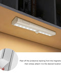 Pack Of Three Motion Activated Rv Step Lights With 10 Bright Leds And Instant Trigger showing the installation process of magnetic light strip.
