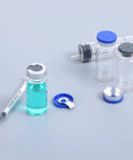 Sibba 10-pack 5ml clear glass injection vials with blue/gray caps; front view shows syringe and liquid bottle nearby.