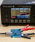 Power-Z SINK240 USB PD3.1 Trigger Board USB C Decoy Module 240W 48V PPS AVS Voltage Tester in testing setup on lab bench