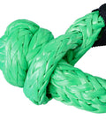 Close-up of Four Pack One Half Inch Green Synthetic Soft Shackle Rope With Protective Sleeve for off-road recovery.