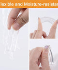 Mini Self Adhesive Drawer Pulls 12 Pack Clear Silicone Handles for Cabinets and Dressers No Punch Install Waterproof Non Toxic Easy Grip for Glass Doors and Windows, flexible clear silicone handle shown bent and water resistant