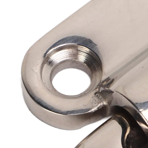 Close-up of stainless steel hole on Folding Pad Eyes D Rings for Marine Yacht Deck Hardware, polished finish, corrosion resistant.