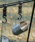 Stainless Steel Water Cup 350ml Multi Function Camping Mug With Smooth Edges Design Silver hanging outdoors on black hook