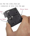 Hand demonstrating Badass Heavy Duty Soldering Station Jig And Tool Holder for Xt90 EC5 EC3 TPlugs in use, showing key components.