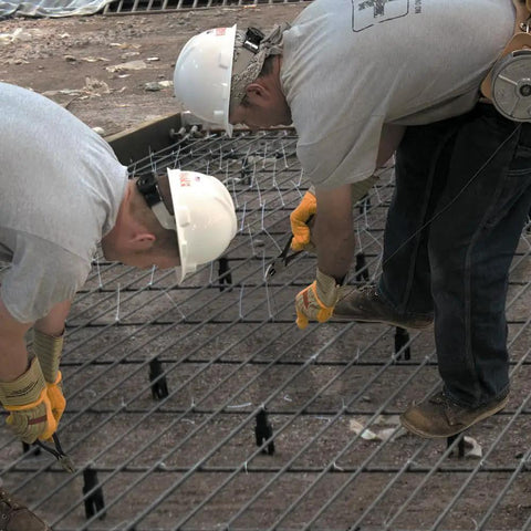 Workers using High Leverage Ironworker's Pliers For Twist And Cut Soft Annealed Tie Wire With Hook Bend Handle on rebar grid