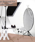 Ultimate Balloon Arch Kit With 10 Clear Spring Clips and 50 Transparent Long Bands used as studio clamps on light reflector