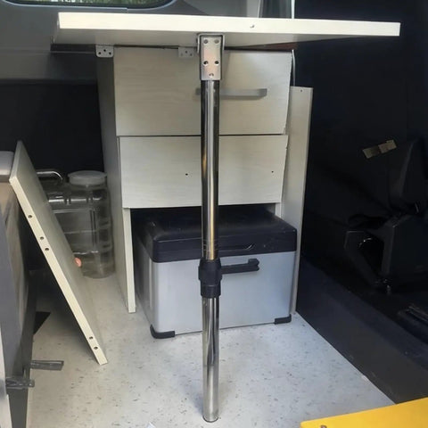 Stainless Steel Table Legs Adjustable Height 18.5 To 28 Inches Folding Leg Set with protective pads in a camper setup