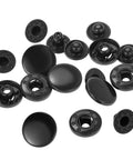 12 Piece Leather Snap Fasteners Kit Built Tough 15Mm Brass Snap Buttons Press Studs Black, shown scattered with detailed caps and sockets.