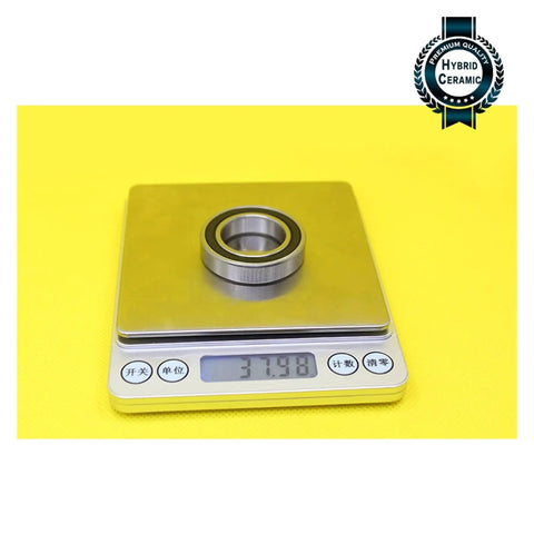 6905 Hybrid Ceramic Bearing 25X42X9MM ABEC-1 Si3N4 Steel Rings on a scale showing weight of 37.98 grams.