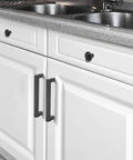 6 Pack Matte Black Stainless Steel Kitchen Cabinet Door Handles With Five Inch Center To Center Spacing installed on white cabinets