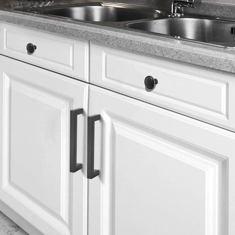 6 Pack Matte Black Stainless Steel Kitchen Cabinet Door Handles With Five Inch Center To Center Spacing installed on white cabinets
