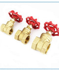 Three brass ball valves with red wheel handles and female threaded ends
