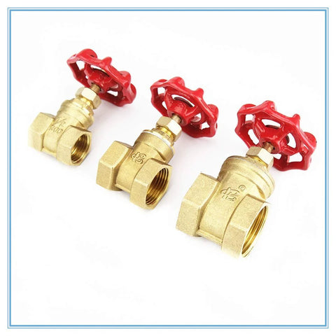 Three brass ball valves with red wheel handles and female threaded ends