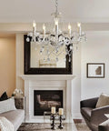 Five Light Modern Crystal Chandelier With K9 Glass Pendants hanging in a stylish living space with elegant decor