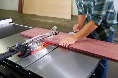 Pro Grade Dust Collection Blade Guard Assembly For Table Saws, With Independent Lateral Guards in use with a table saw