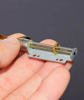 Heavenly Smooth 8MM DC 5V 12V Precision Stepper Motor With 30Mm Stroke Linear Actuator in hand, showcasing metal build and design.