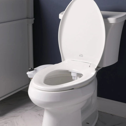 SlimEdge Non Electric Bidet Attachment For Toilet With Dual Front And Rear Nozzles installed on a white toilet