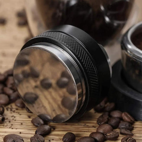 51mm Espresso Tamper And Distributor Dual Head Coffee Leveler for Delonghi 51mm Portafilter on wooden surface with coffee beans
