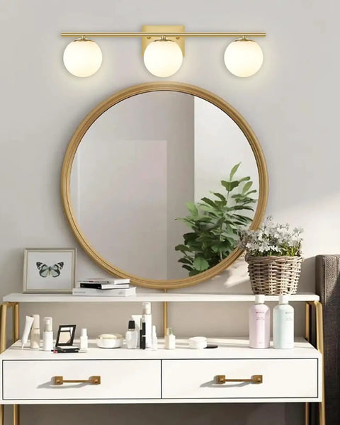 Brushed Brass 24 Inch Three Light Vanity Light With Modern Globe Glass Shades Damp Rated Wall Sconce for Over Mirror.
