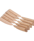 Eight softwood pocket hole plugs from the 50 Piece Pocket Hole Plugs Woodworking Dowel Kit for seamless joints.