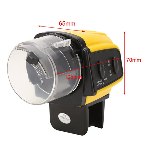 Dead Simple Automatic Fish Feeder With Battery Powered Digital Timer and Sleek LCD Panel, yellow plastic design, 105mm size.
