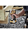Person using 20V Max Cordless Impact Wrench with 3/8 Inch Drive, Hog Ring Anvil, Tool Only, on wooden structure