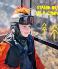 Child wearing iguana themed helmet mohawk accessory with sticky hook and loop fastener adhesive, skiing gear, outdoors
