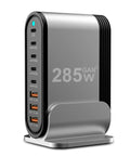 Powerhouse 8 Port USB C Fast Charger Dock with 285W Output, vertical stand, silver color, multiple USB ports labeled by wattage