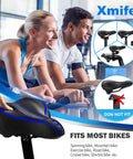 Oversized Comfy Bike Seat With Extra Padding And Memory Foam For Men And Women Universal Replacement Bicycle Saddle Waterproof Leather Blue Tailbone Relief shown in gym setting