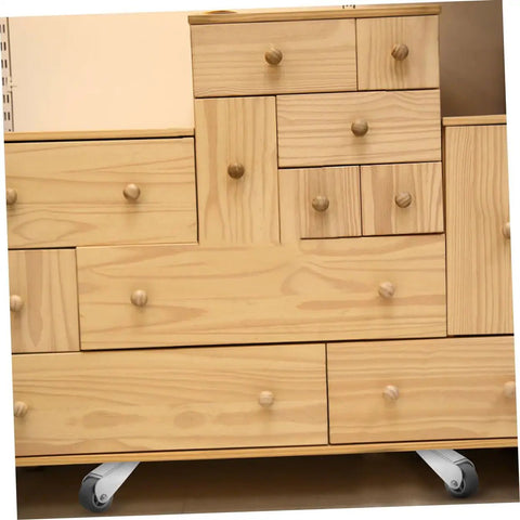 Galvanized Sliding Door Rollers And Quiet Caster Wheels For Barn And Wardrobe Doors Slick Smooth Glide Action With No Sweat Quick Install Solid Two Pack Space Saving Pulleys under a wooden cabinet with multiple drawers and caster wheels.