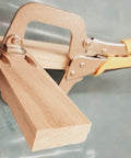 Side view of Three And A Half Inch Open Depth Quick Release Face Frame Clamp Workhorse With Extra Large Pad For Pocket Hole Jig Assembly Ideal For Cabinet Face Frames Boxes And Picture Frames Model 81934 clamping wood.