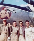 Four men posing in front of a WWII aircraft with "Wicked Woman" nose art. One Seventy Two Scale P 38 Lightning Decal Set For Aircraft Models, Pro Grade Water Slide Decals For Modelers, Easy Apply, High Detail WWII Style Markings, Authentic Accessories For Hobbyists, Durable Paper Decals.
