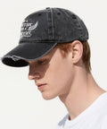 Side profile of a man wearing a breathable men's baseball cap with vented top holes and sweat-wicking design.