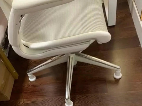 Office chair with Bell Glides High Profile 2.5 Inch 5 Pack White for carpet replacement, showing stationary castor installation.