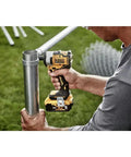 Person using 20V Max Cordless Impact Wrench With 3/8 Inch Drive, Hog Ring Anvil, Tool Only, Powers Through Fasteners