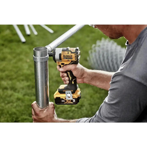Person using 20V Max Cordless Impact Wrench With 3/8 Inch Drive, Hog Ring Anvil, Tool Only, Powers Through Fasteners