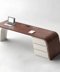 Slick Oversized L Shaped Home Office Desk With Solid Wood Base And Deep Storage Drawers Large Rock Board Top view with laptop and notebooks.